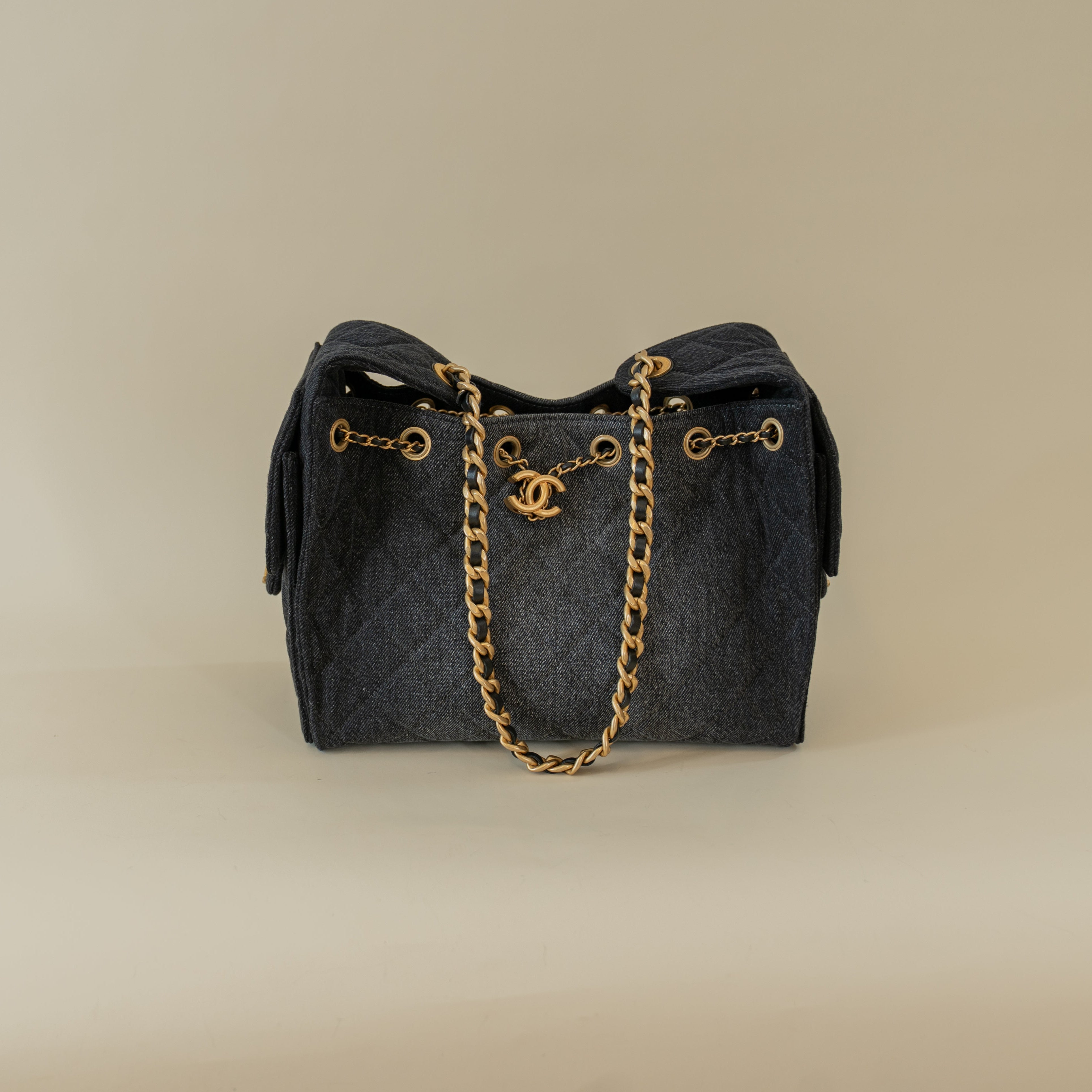 PRE-OWNED Denim Quilted Small Chanel 25 Handbag Black