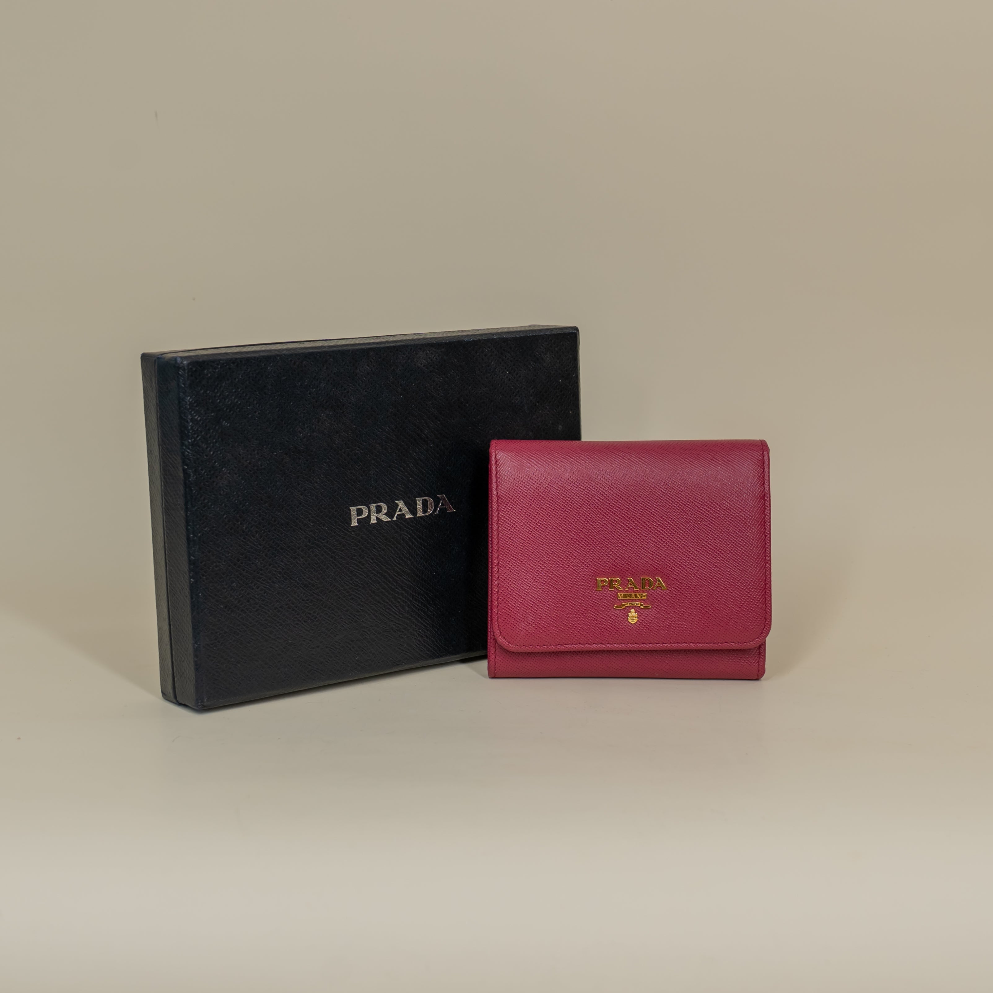 PRE-OWNED Pink Saffiano Metal French Flap Compact Wallet