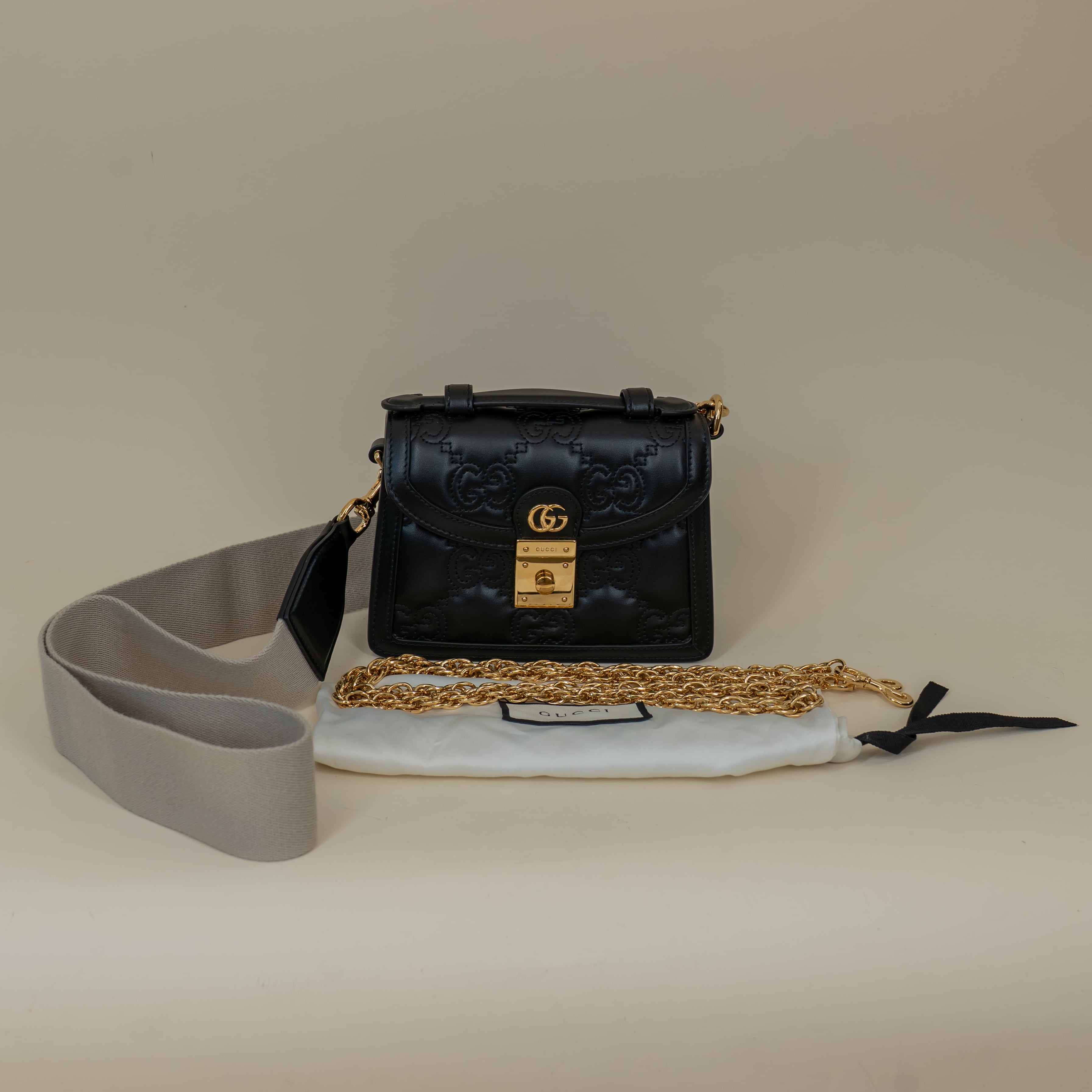 PRE-OWNED Black Calfskin GG Matelasse Mini Top Handle Shoulder Bag