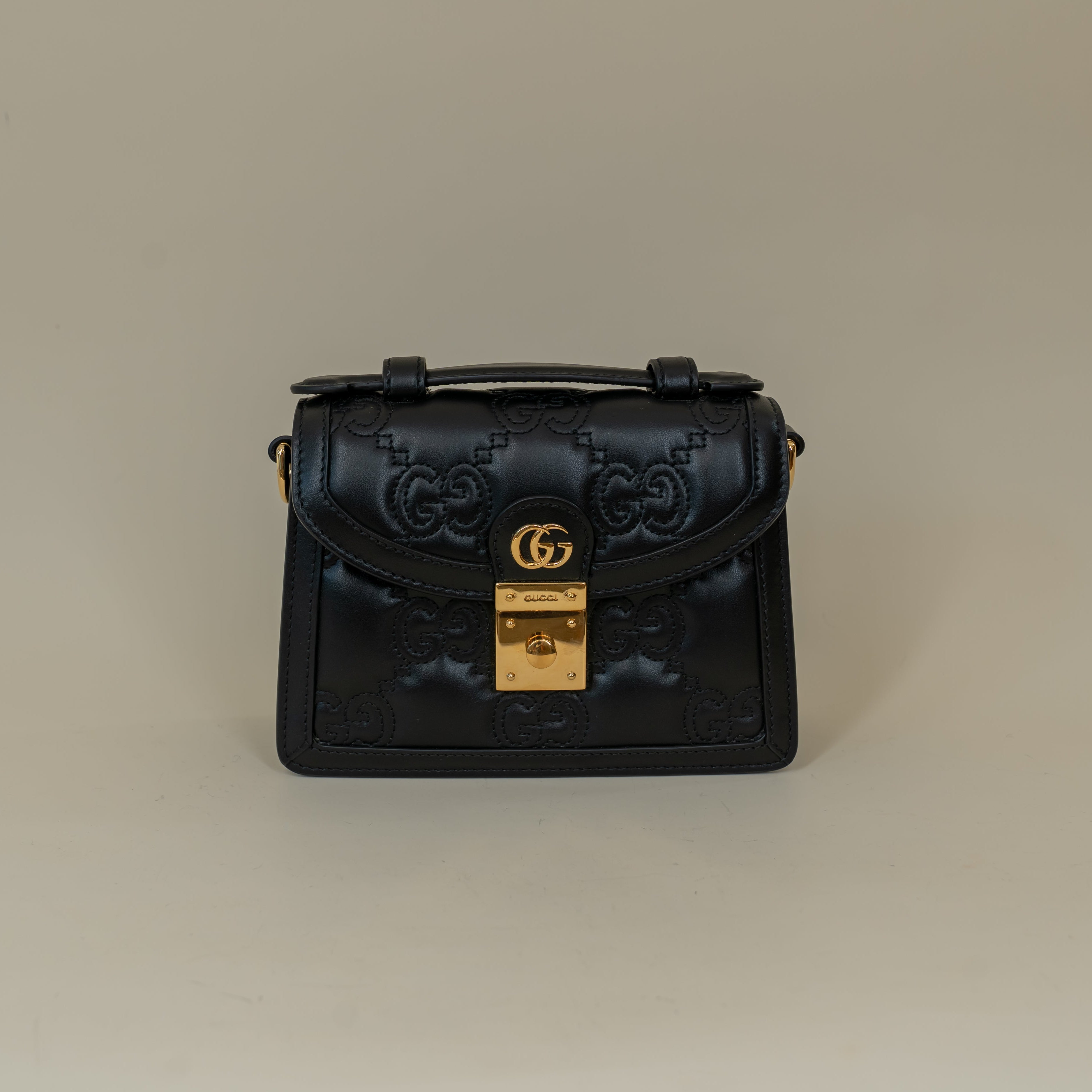 PRE-OWNED Black Calfskin GG Matelasse Mini Top Handle Shoulder Bag