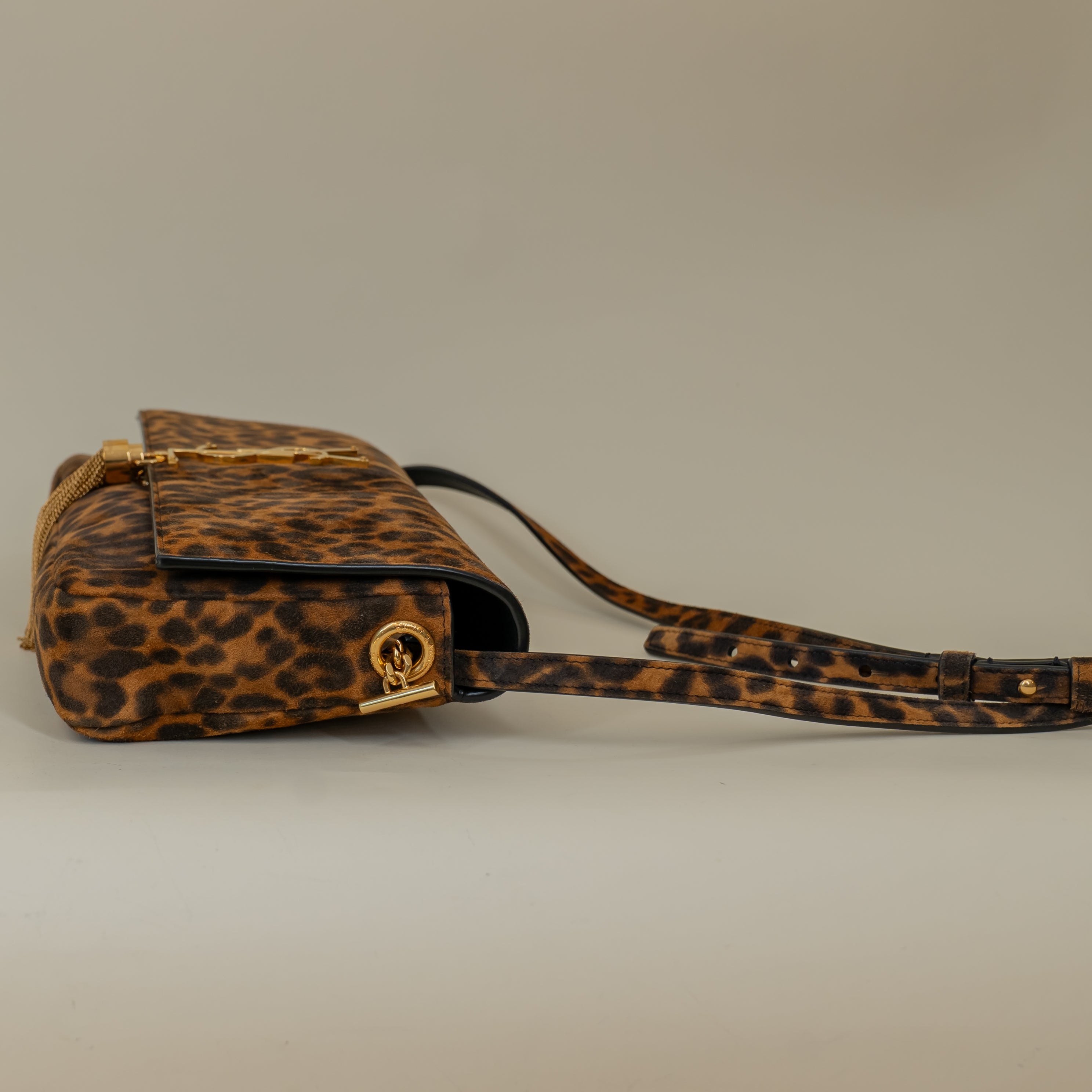 PRE-OWNED Suede Leopard Print Monogram Tassel Kate 99 Crossbody Bag