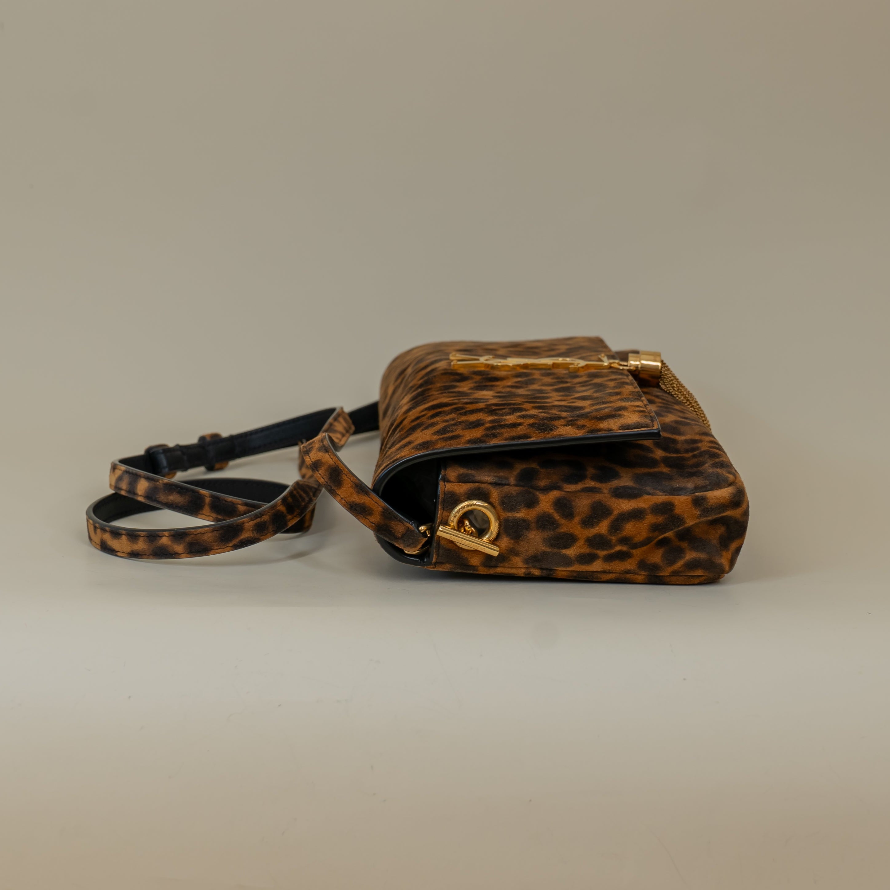 PRE-OWNED Suede Leopard Print Monogram Tassel Kate 99 Crossbody Bag