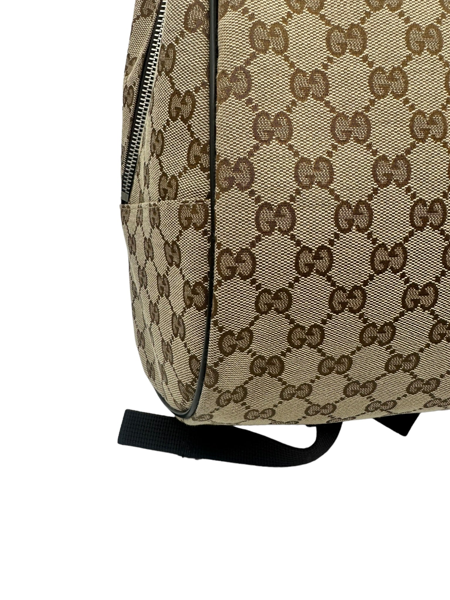 GUCCI - Mochila con ribete de piel y lona GG