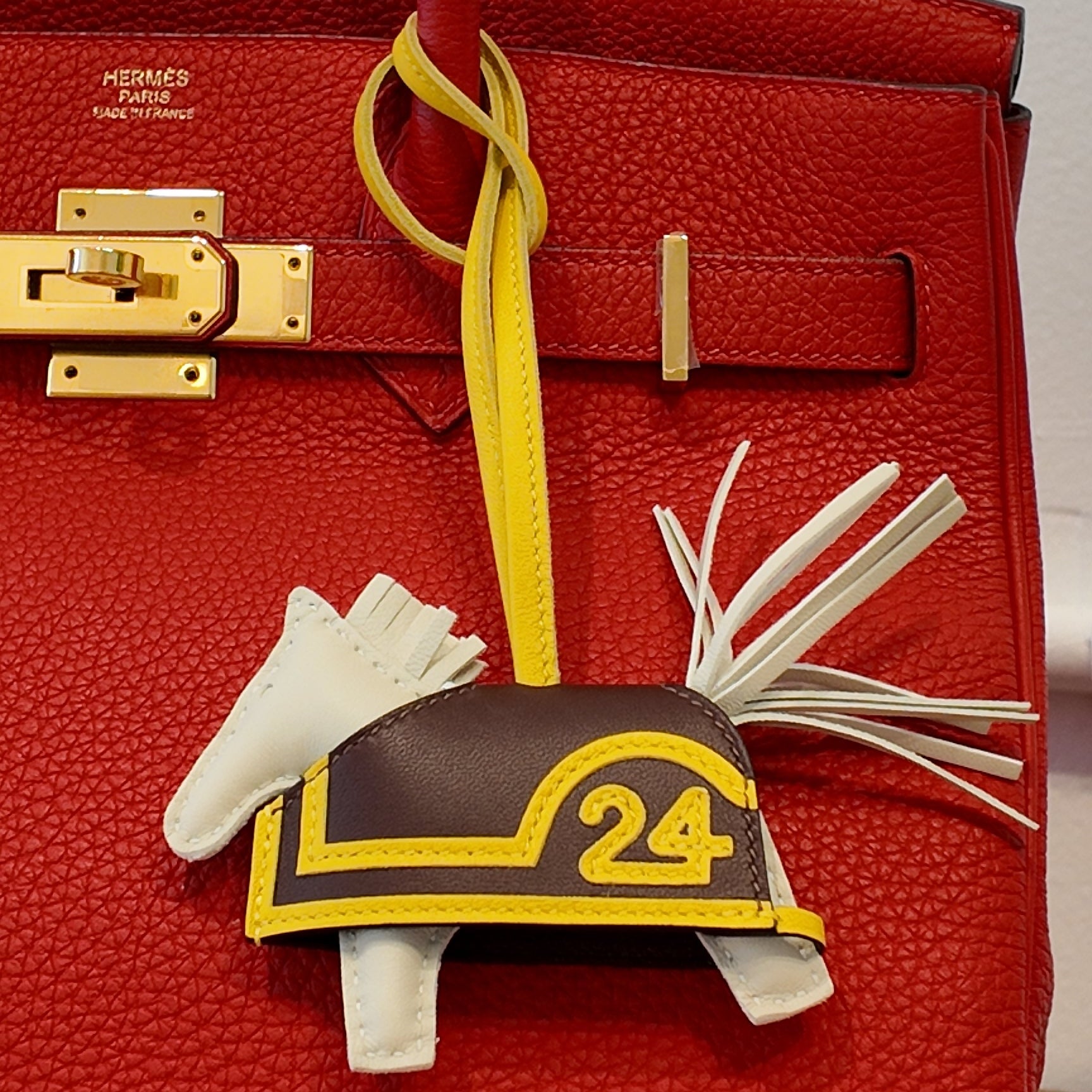 PRE-OWNED Milo Lambskin Grigri Rodeo Robeo 24 Bag Charm
