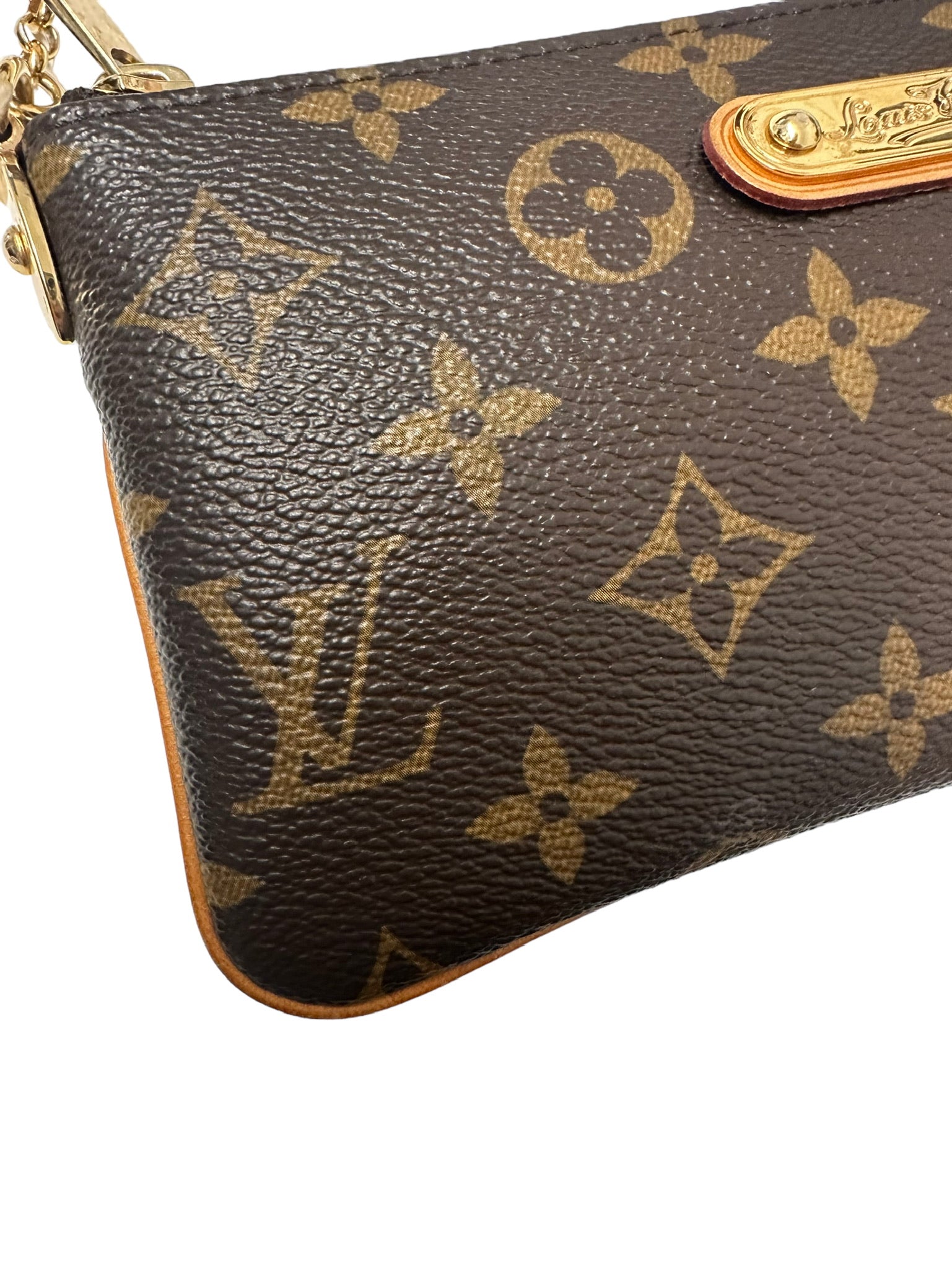 LOUIS VUITTON - Pochette de lona con monograma Milla