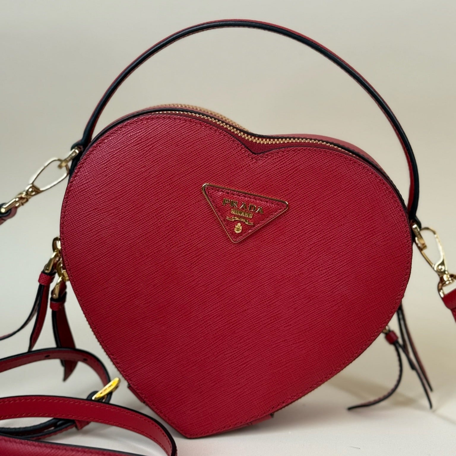 PRE-OWNED Red Saffiano Odette Heart Crossbody Bag