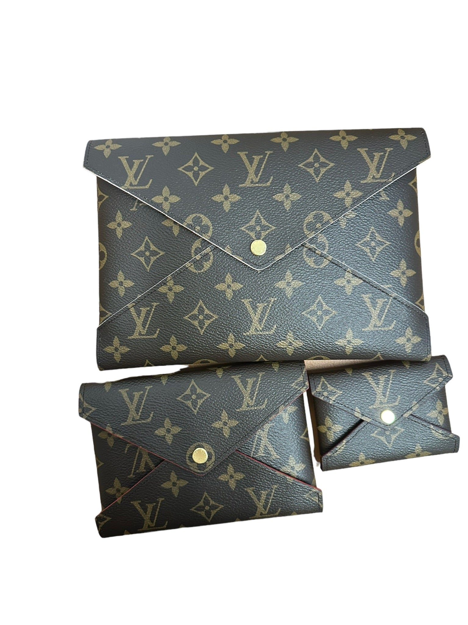 LOUIS VUITTON - Conjunto de pochette Kirigami con monograma