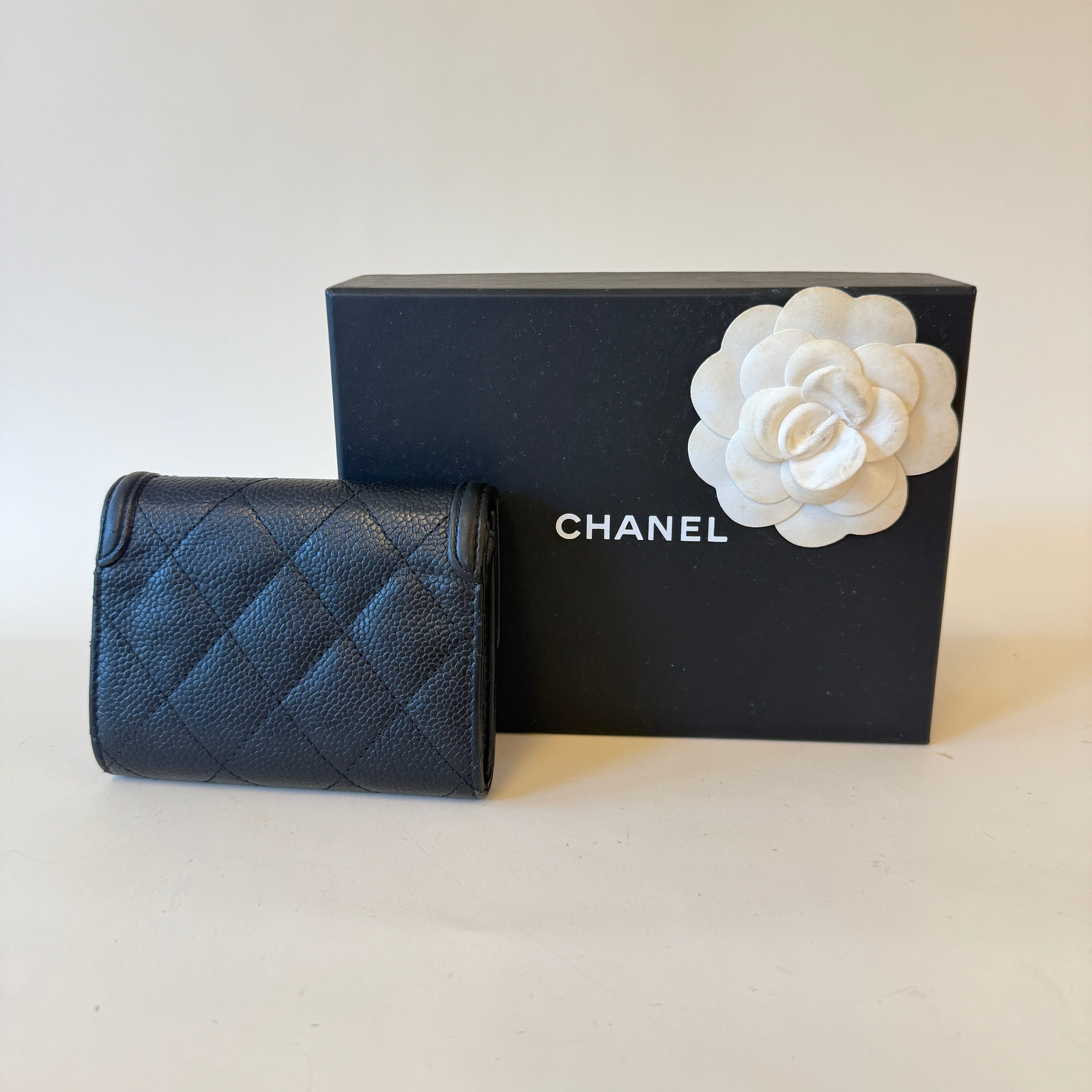 PRE-OWNED Black Caviar Leather Small CC Filigree Flap Wallet