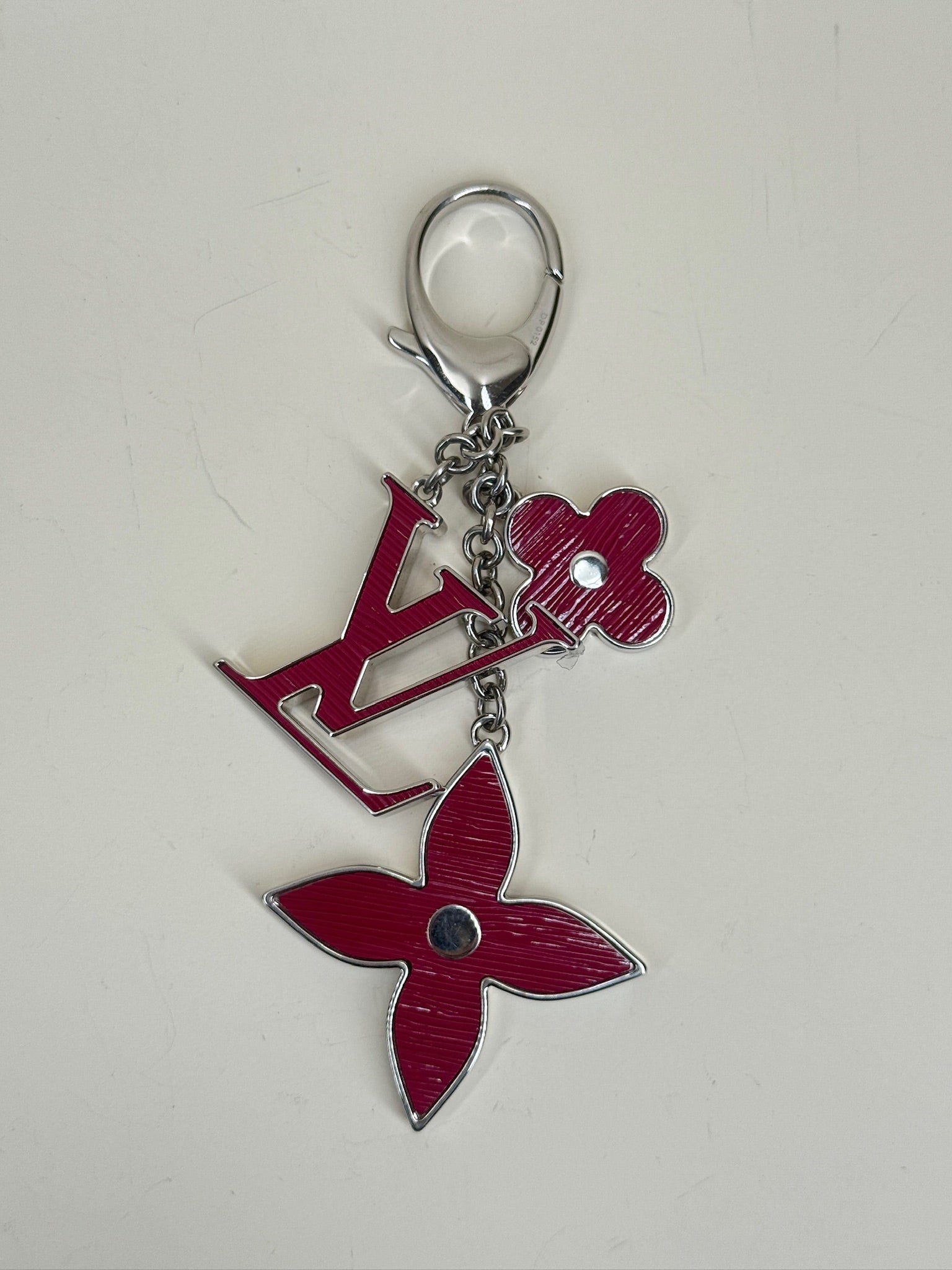 Charm para bolso Fleur d'Epi fucsia LV USADO
