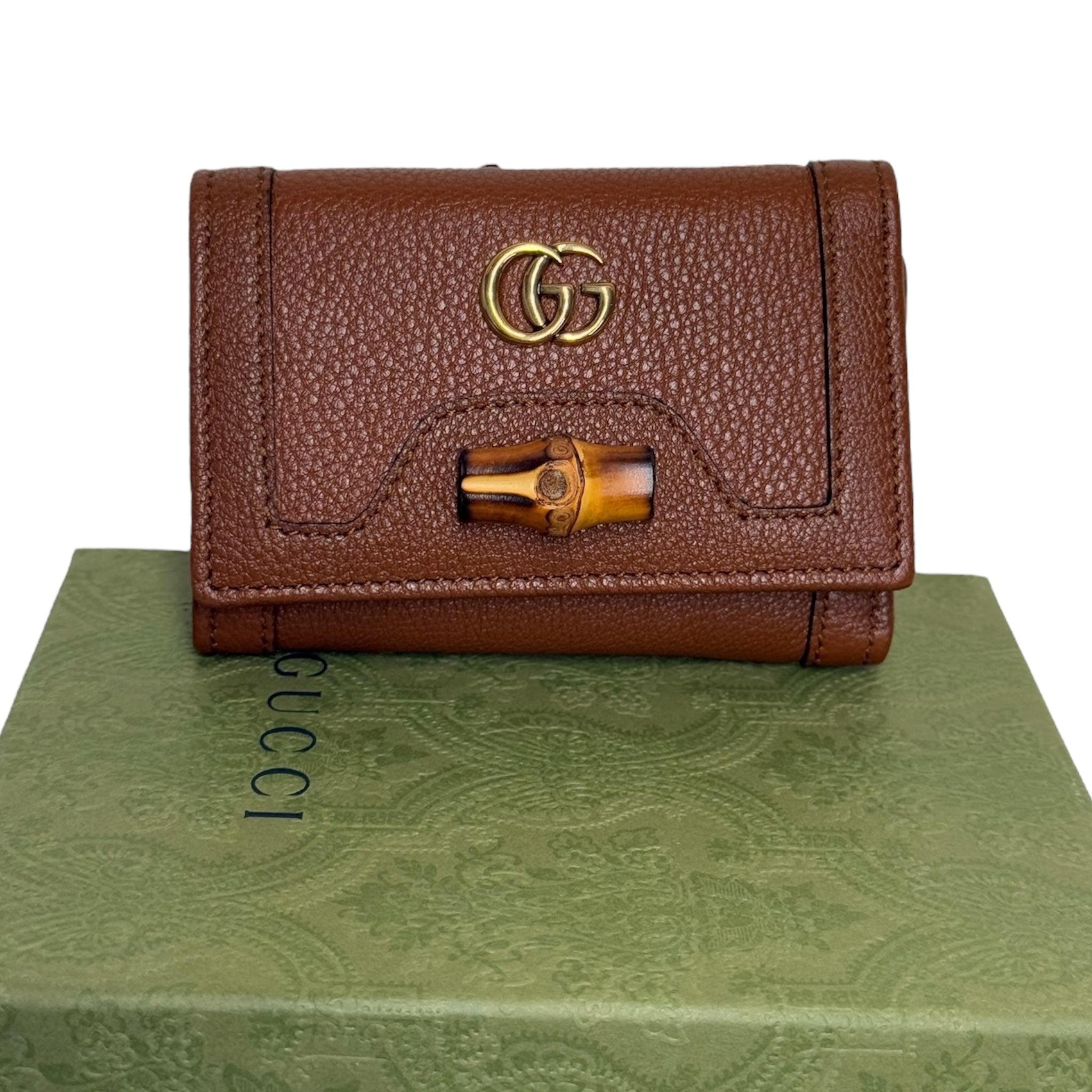 Cartera triple plegable de cuero marrón bambú GG Diana de segunda mano