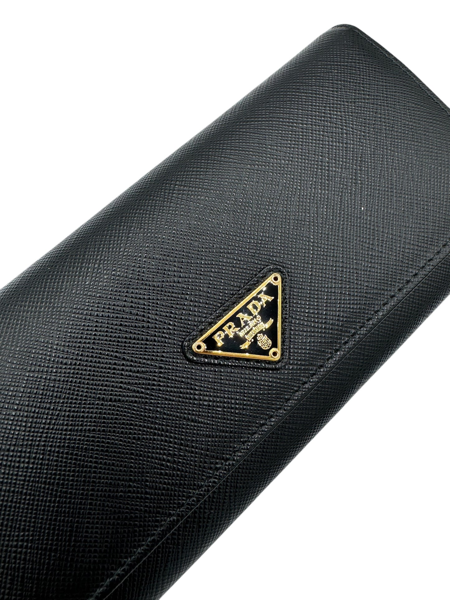 PRE-OWNED Black Saffiano Triangle Logo Continental Flap Travel Wallet