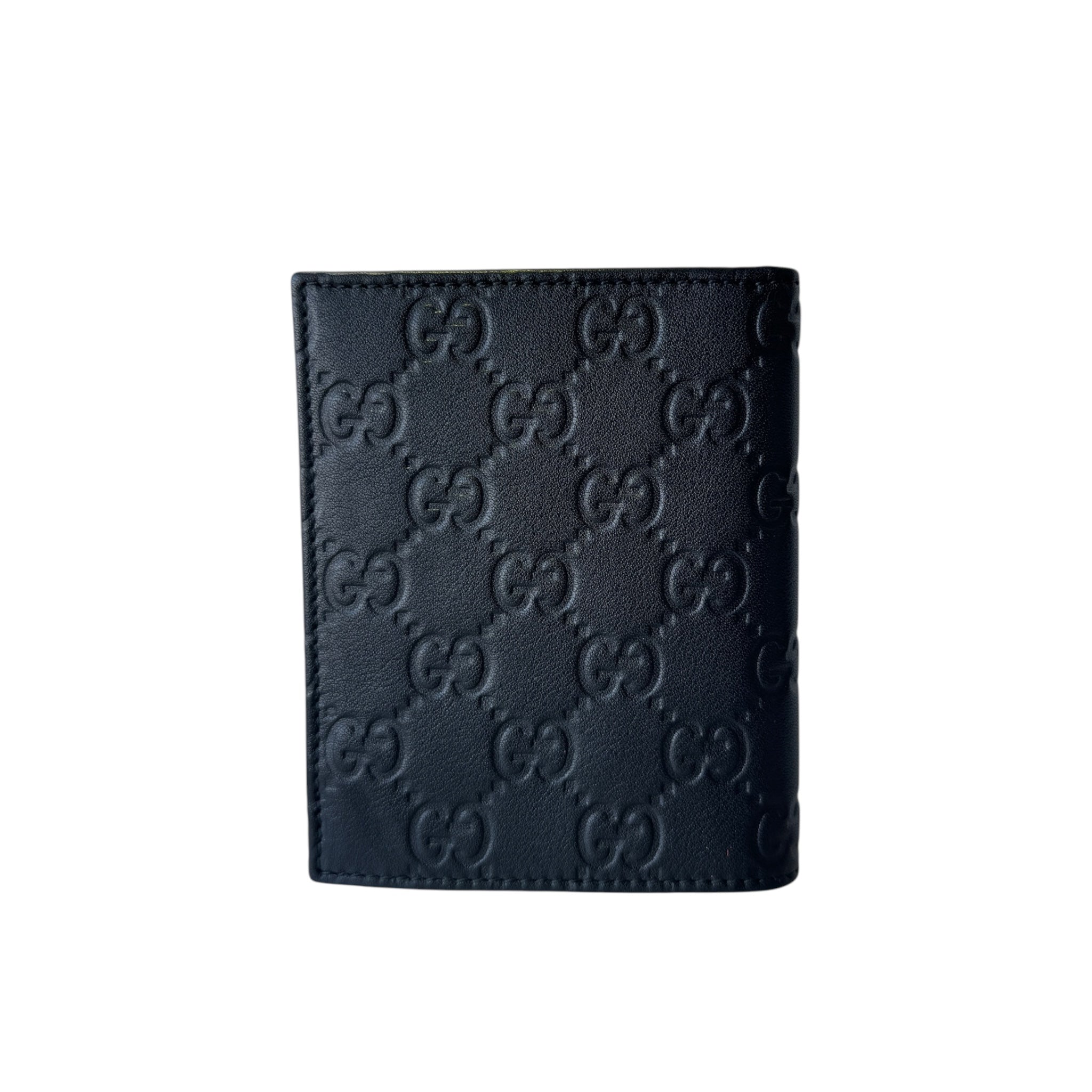 Cartera corta Guccissimo de piel negra con bordado GG de segunda mano