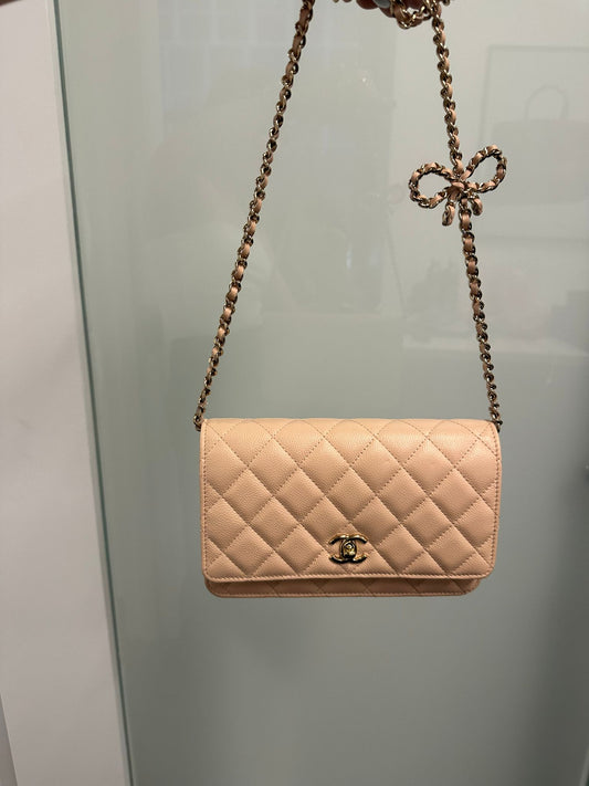 CHANEL - 23S Light Beige Quilted Caviar Bow WOC