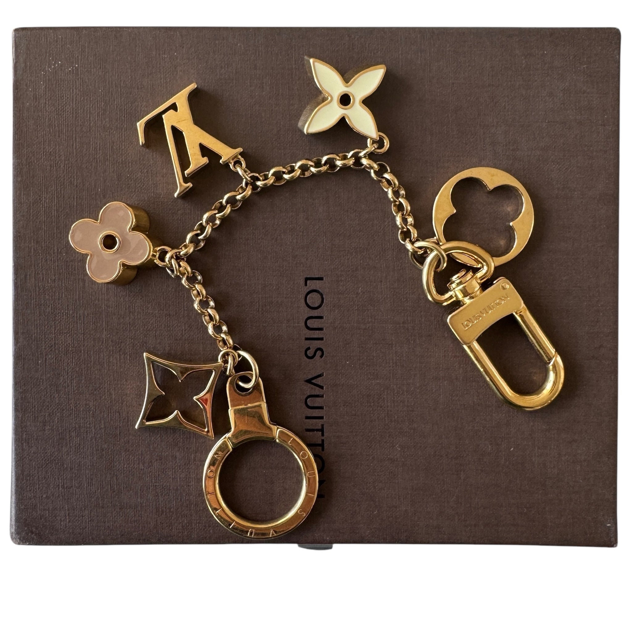 PRE-OWNED LV Gold Monogram with Flower Long Bag Charm