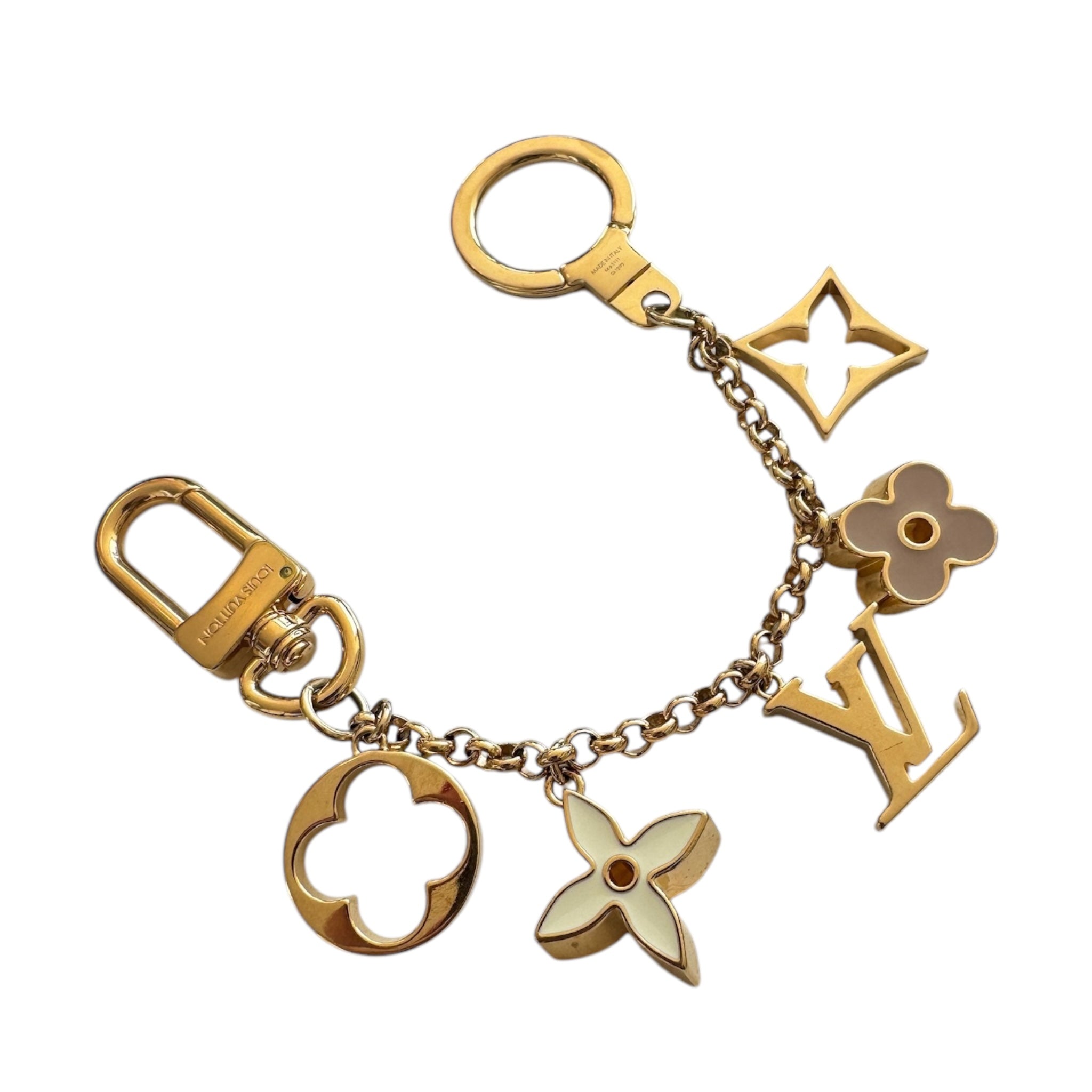 PRE-OWNED LV Brass Enamel Fleur De Monogram Bag Charm Chain Gold
