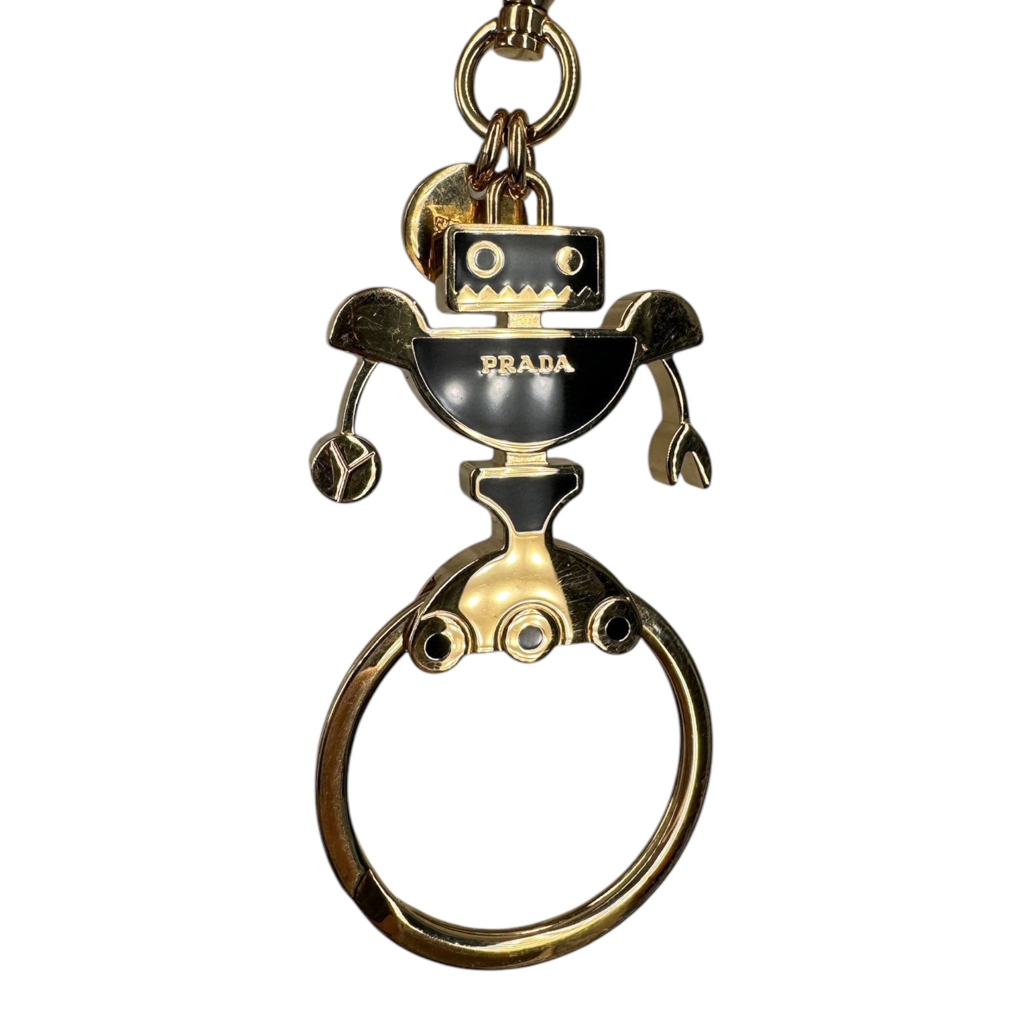 Charm para bolso triangular con robot dorado USADO