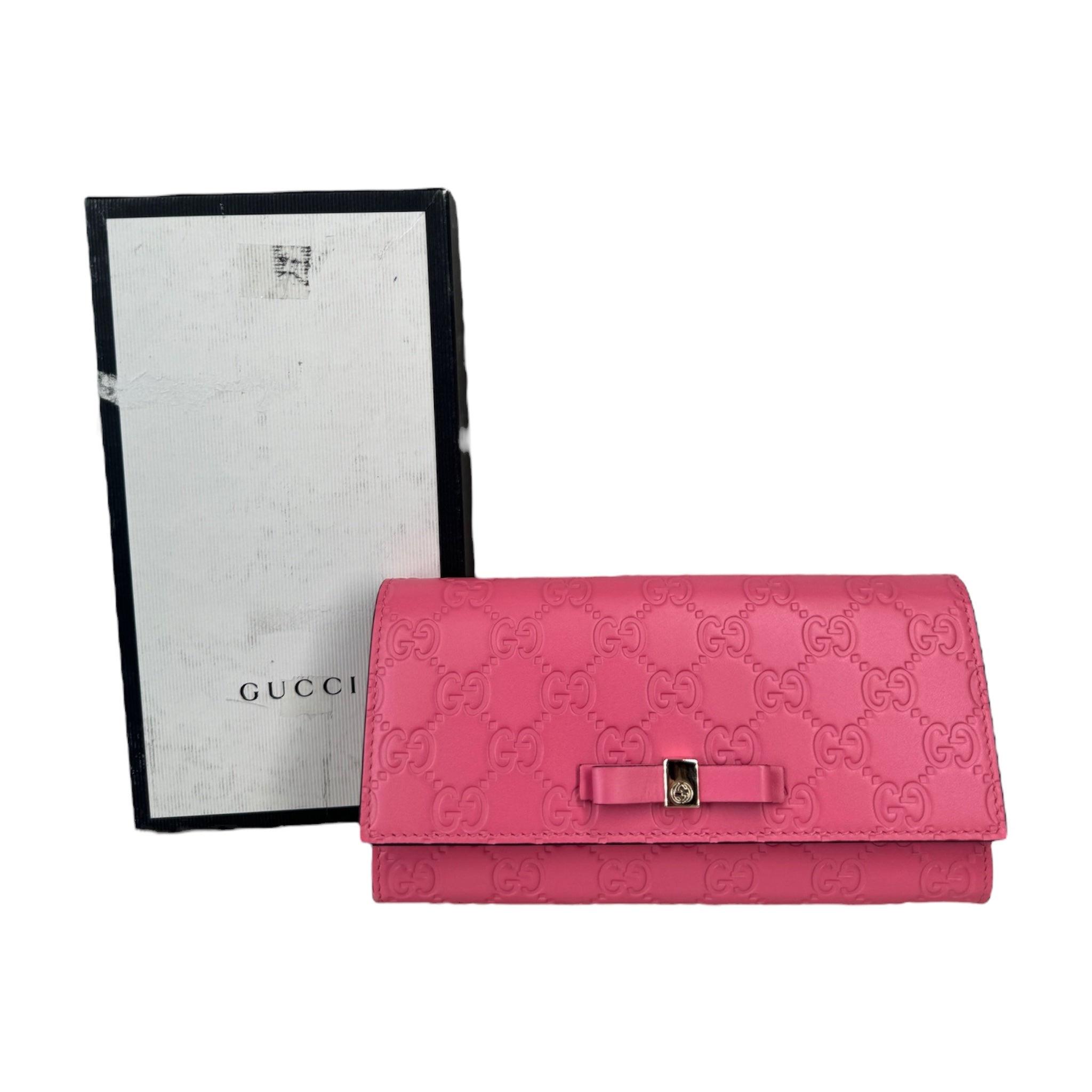 Cartera larga continental con lazo Guccissima rosa GG de segunda mano