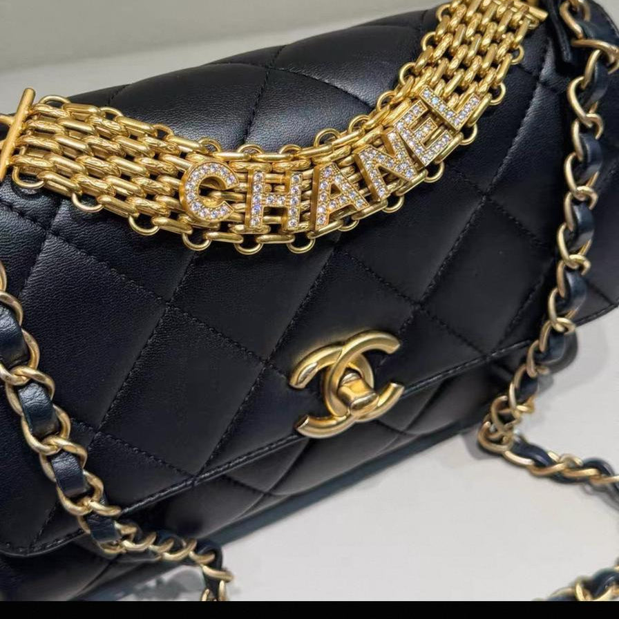 PRE-OWNED Black Quilted Lambskin Leather Mini CC Crystal Logo Chain Flap Bag (PART 1)