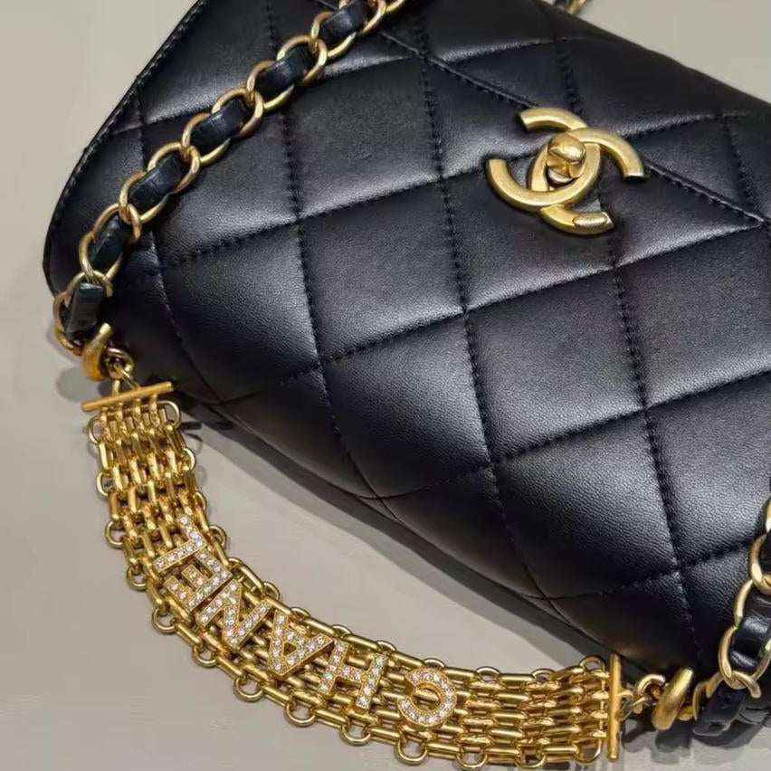 PRE-OWNED Black Quilted Lambskin Leather Mini CC Crystal Logo Chain Flap Bag (PART 1)