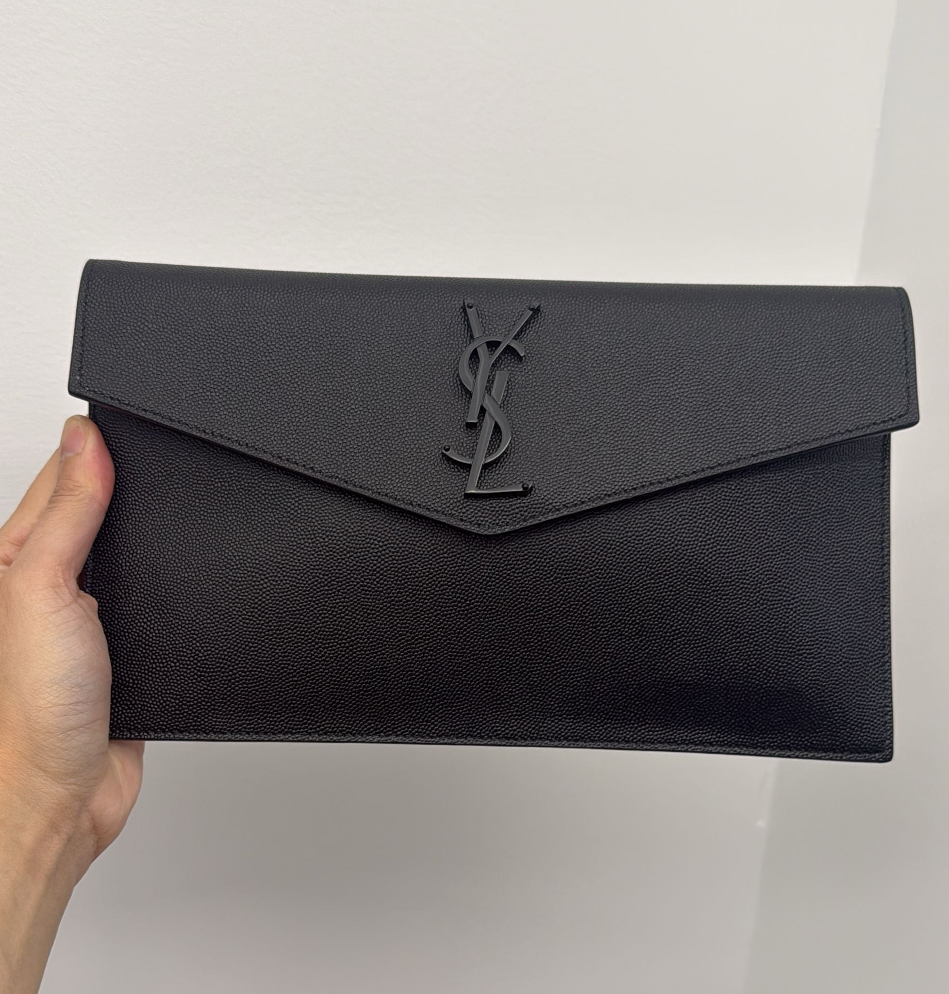 PRE-OWNED Black Uptown Pouch in Grain de Poudre