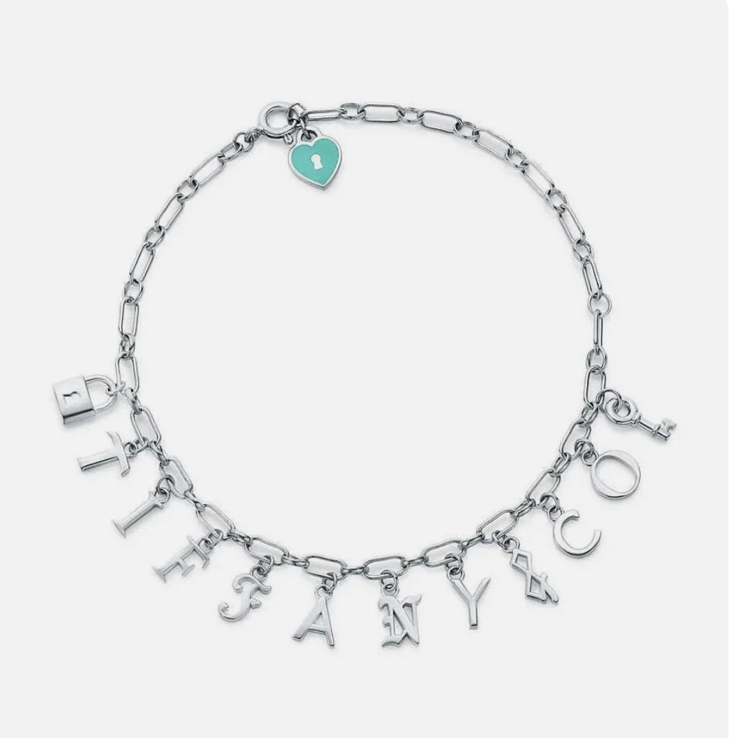 TIFFANY & CO. - Letters Charm Bracelet in Sterling Silver