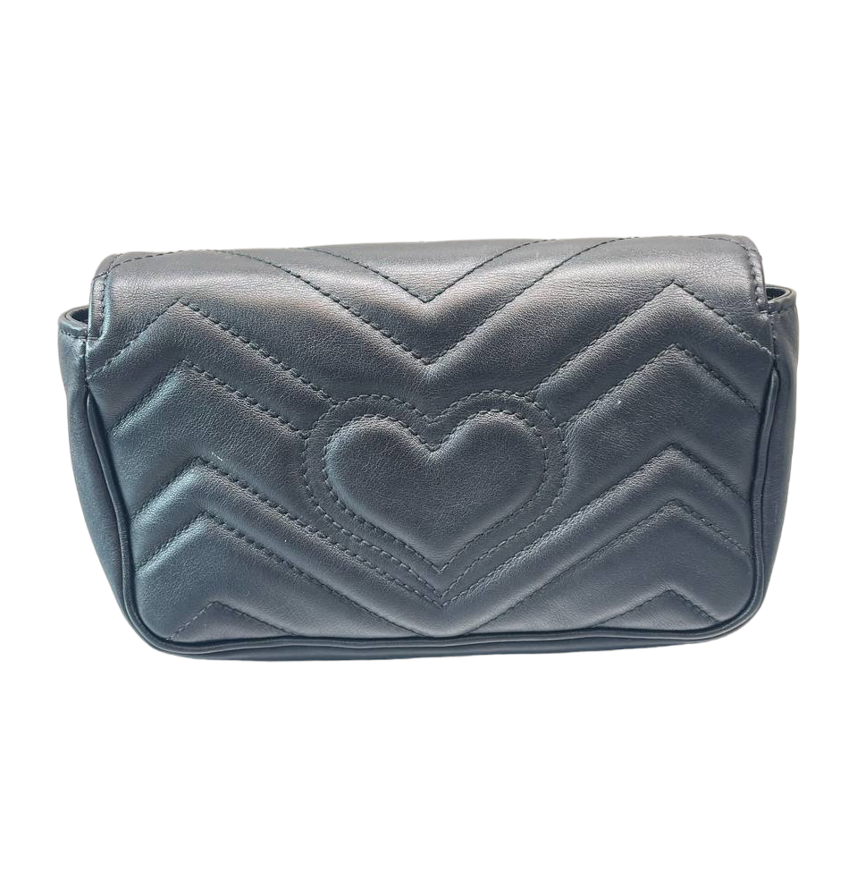 GUCCI - Bolso con solapa GG Marmont de piel matelasse Super Mini