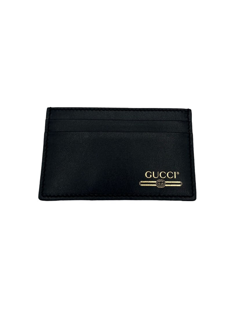 GUCCI - Tarjetero de piel negra y dorada